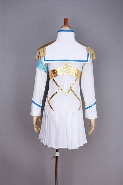 Back view white cosplay dress with blue collar trim, gold crisscross harness and fringe