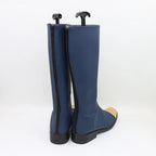 Navy-blue tall boots with gold accent stripe, black soles; rear view of heels and shafts.