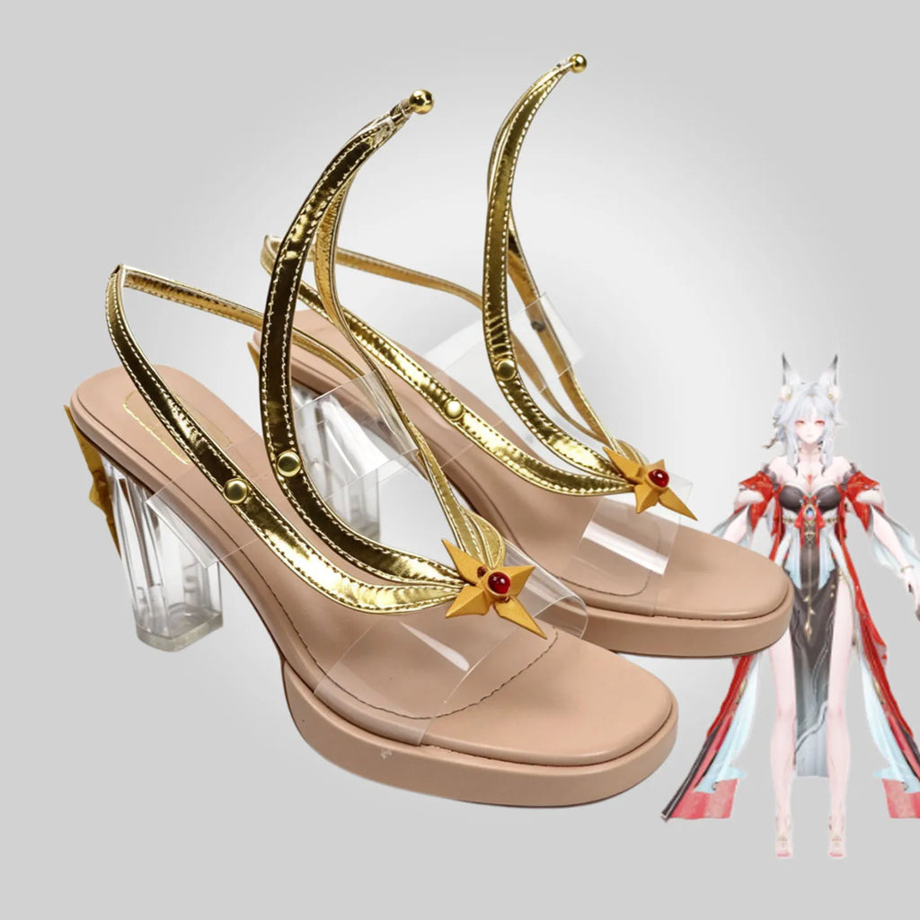 Nude pink high-heel sandals with gold trim, clear heels, star accents, red jewel straps